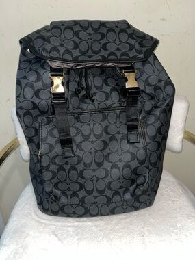 Source Unknown Black and Charcoal Logo-Pattern Backpack